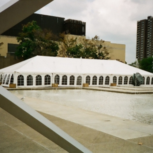 White tent set up outdoors