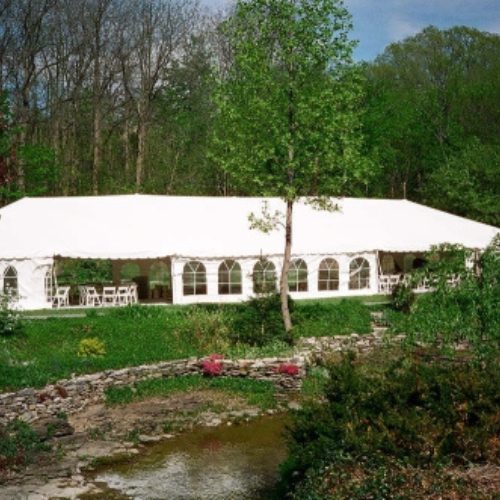 White tent set up outdoors