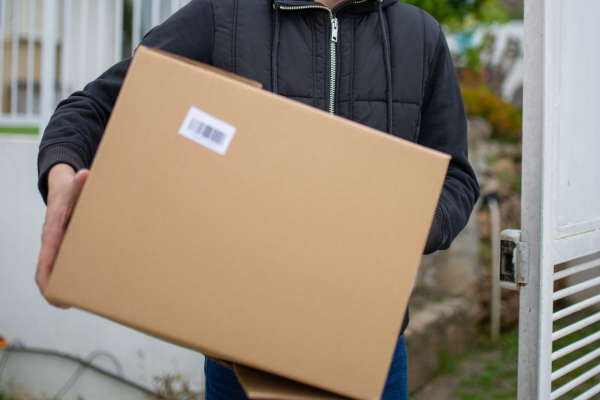 Man carrying a cardboard box